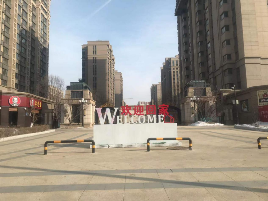 恒大北湖印象项目门口“欢迎回家”四个字格外醒目。张志强/摄