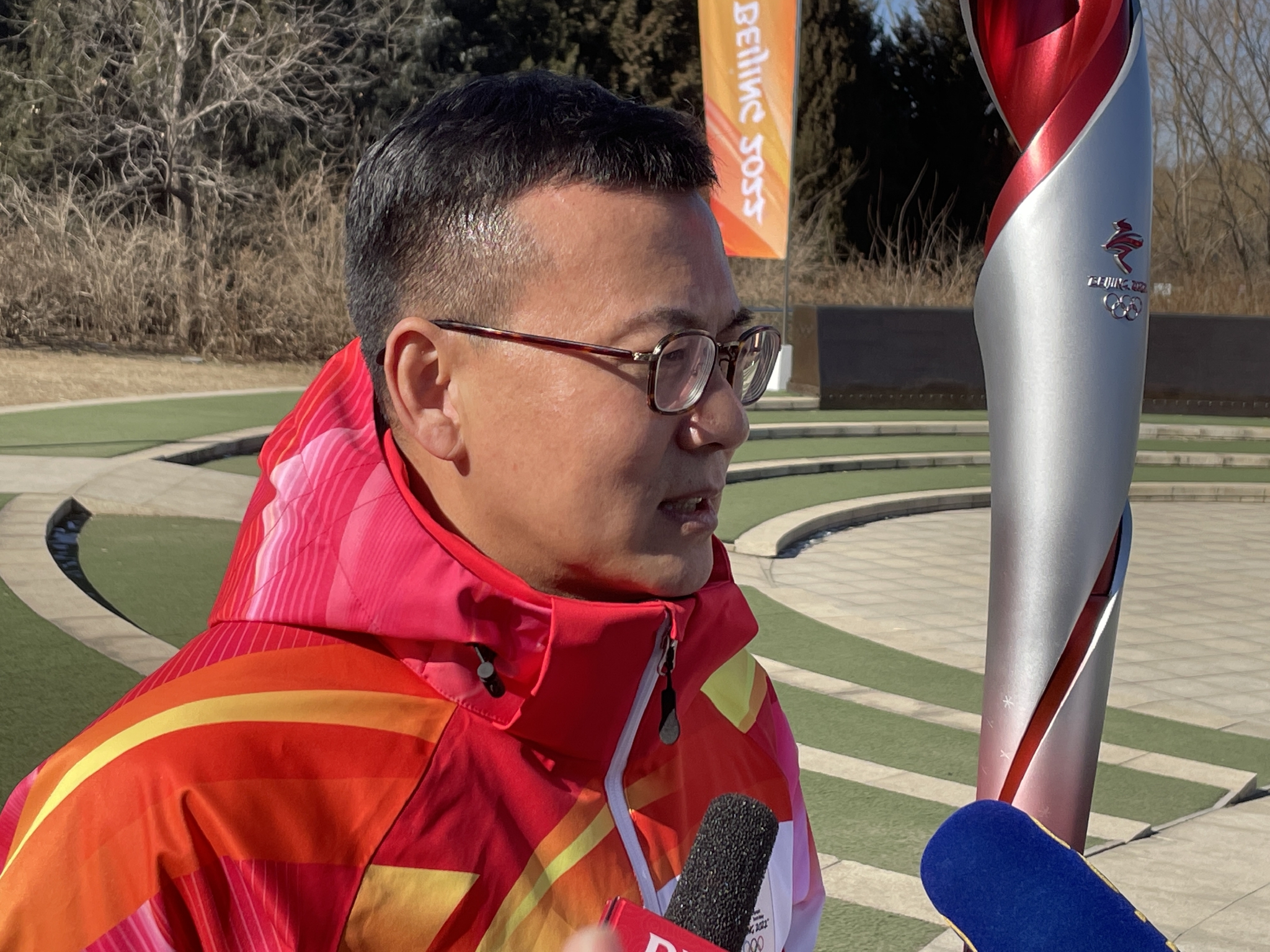 "双奥"火炬手李兴钢:个人幸运源于时代机遇|冬奥会|李兴钢|高山滑雪