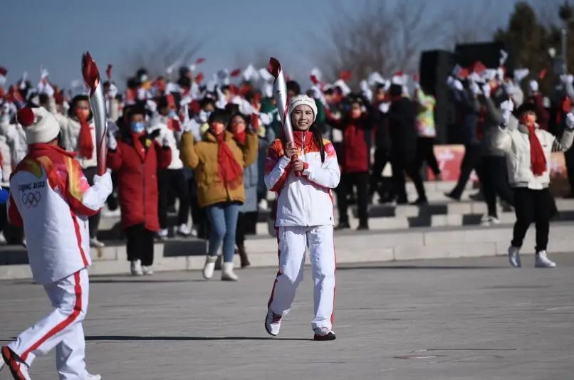 草原客户端记者在张家口｜北京冬奥会火炬在张家口传递休闲区蓝鸢梦想 - Www.slyday.coM
