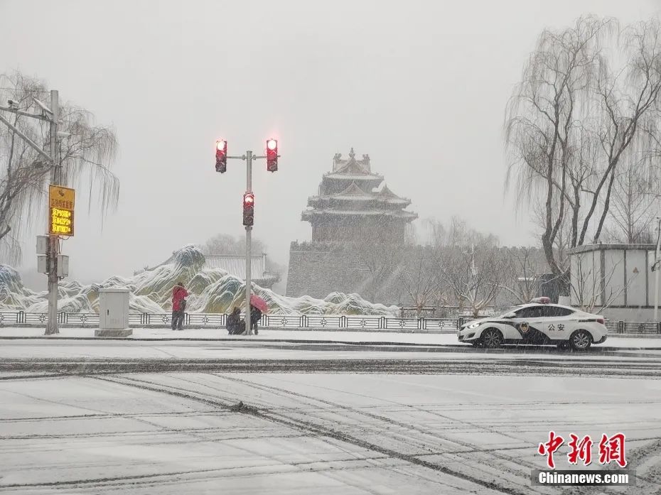 2月13日，北京迎虎年首场降雪。图片来源：视觉中国