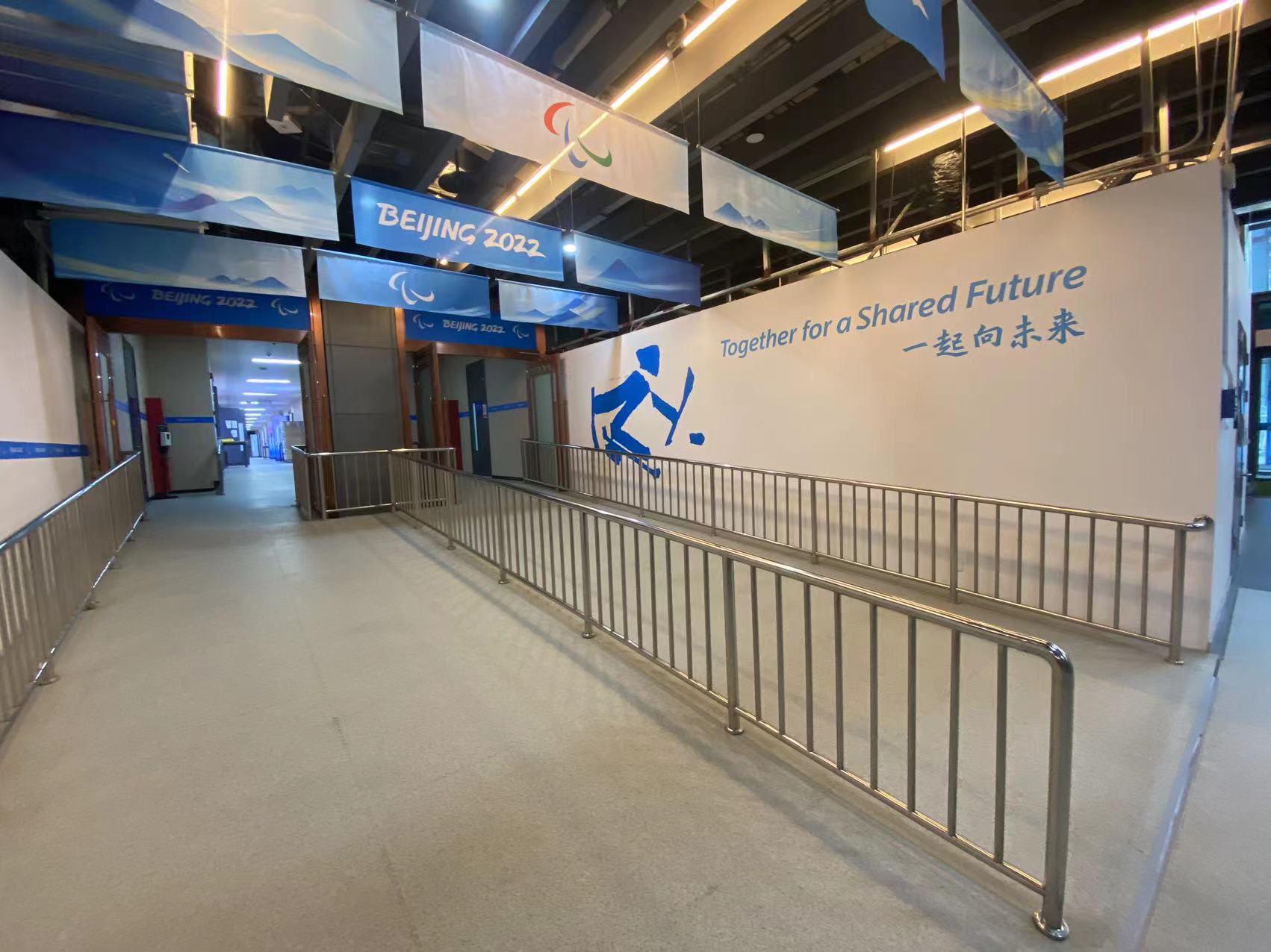 北京冬残奥会｜国家体育馆“冰之帆”里，这些无障碍设施细节满满休闲区蓝鸢梦想 - Www.slyday.coM