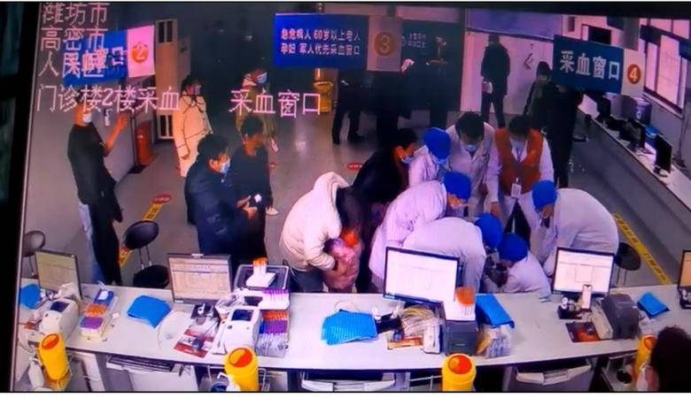女子采血后突然晕倒在地，6名医护人员翻越柜台抢救休闲区蓝鸢梦想 - Www.slyday.coM