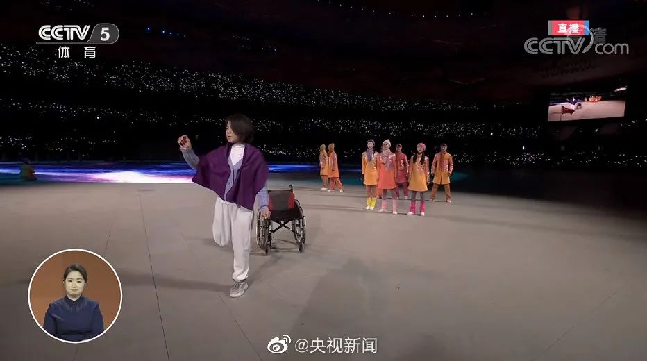 一捧微火,一片光明！盲人火炬手点燃冬残奥会主火炬，今夜的鸟巢让人感动休闲区蓝鸢梦想 - Www.slyday.coM