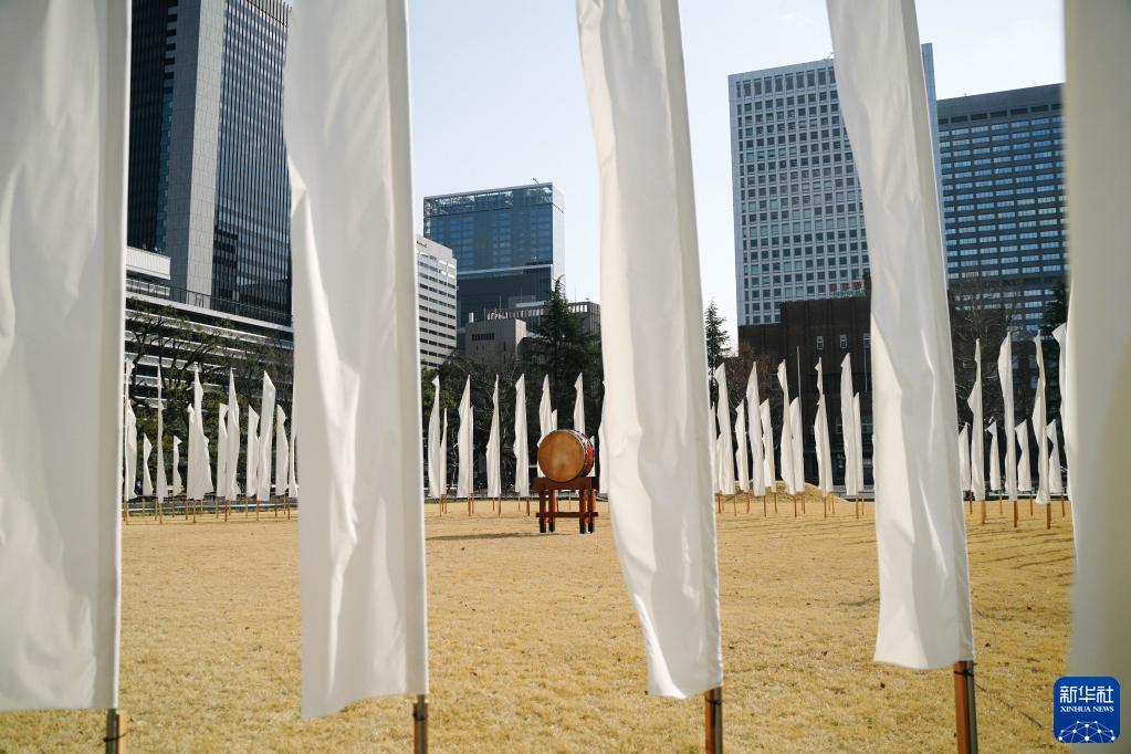 日本悼念“3·11”大地震及海啸遇难者休闲区蓝鸢梦想 - Www.slyday.coM