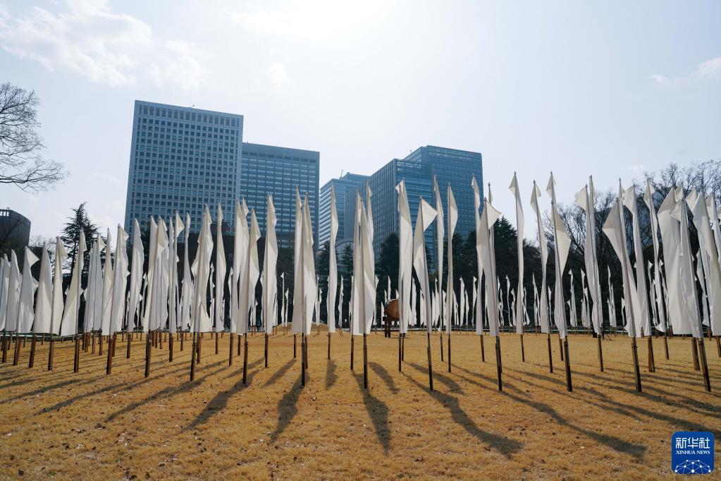 日本悼念“3·11”大地震及海啸遇难者休闲区蓝鸢梦想 - Www.slyday.coM