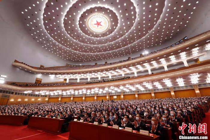 3月11日,第十三届全国人民代表大会第五次会议在北京人民大会堂举行闭幕会。中新社记者 盛佳鹏 摄