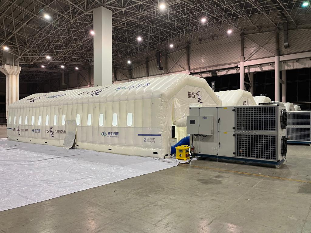 新华全媒 丨74名"火焰蓝"11小时完成核酸检测气膜方舱搭建