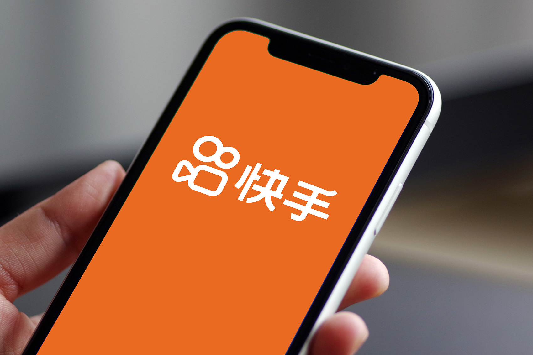 快手2021营收超800亿同比增379四季度日活323亿创新高