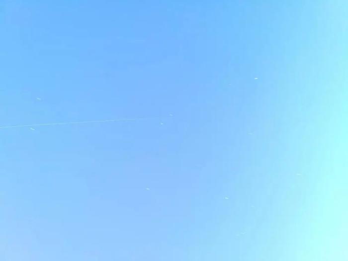3月27日，中国空间站组合体、天舟二号货运飞船飞越北京上空。(沈京玲 摄)