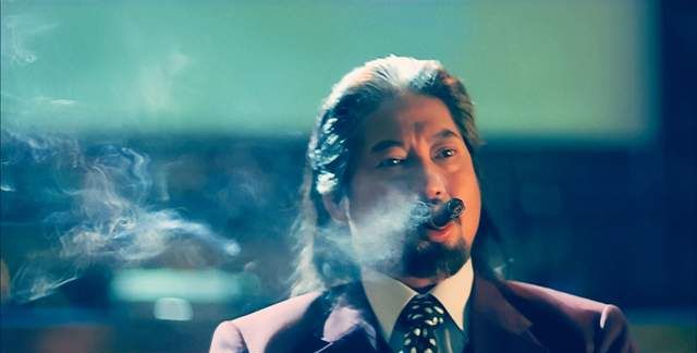 和胜和"四眼柱",客串黑帮电影并担任顾问,晚年因欠债街头被砍|何国柱