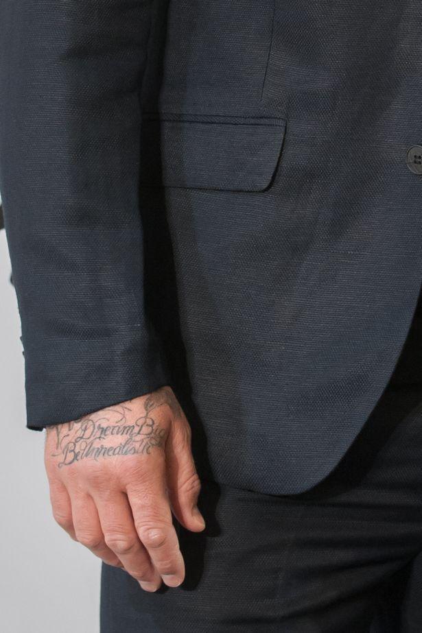 贝克汉姆身上60多个纹身每个纹身都有故事一行中文寓意深刻