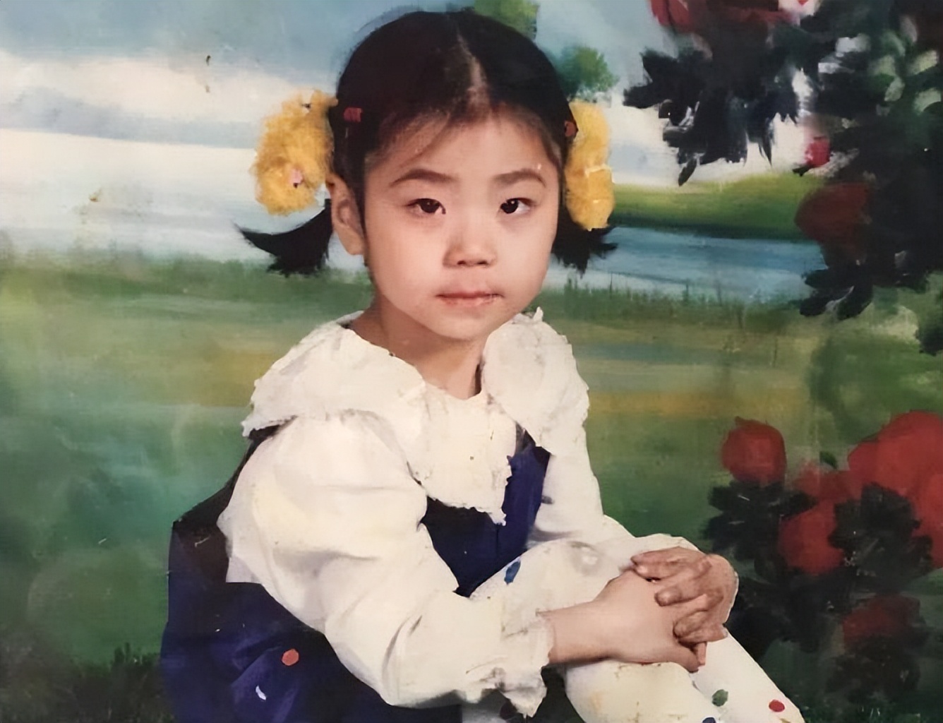 刘晓彤和杨珺菁小时候的照片也能认出来,因为有进入国家队时候的影子.