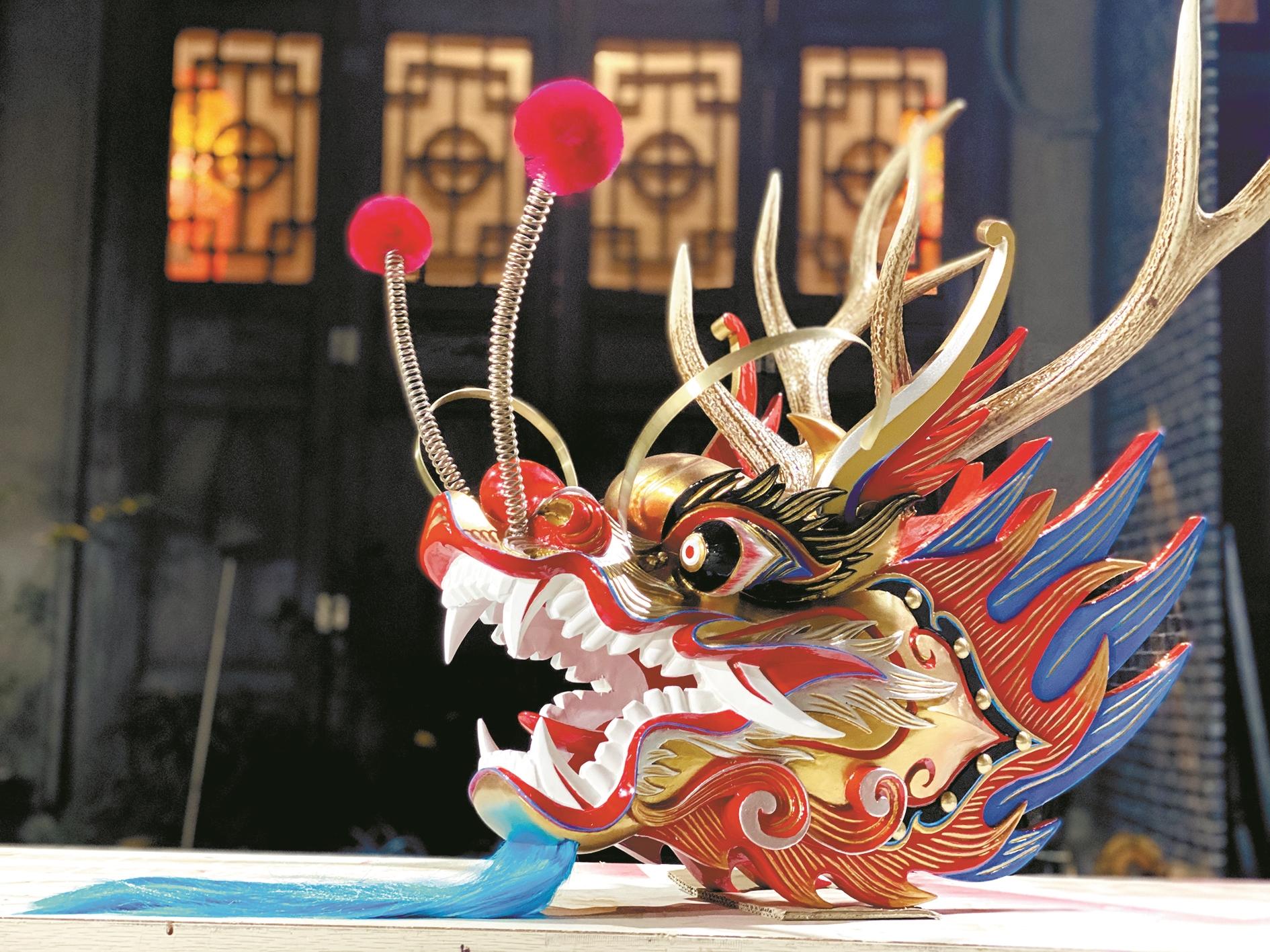 【网络中国节·端午】龙船头背后的匠心传承——他们将广州民俗文化 一刀一刀刻进龙头里休闲区蓝鸢梦想 - Www.slyday.coM