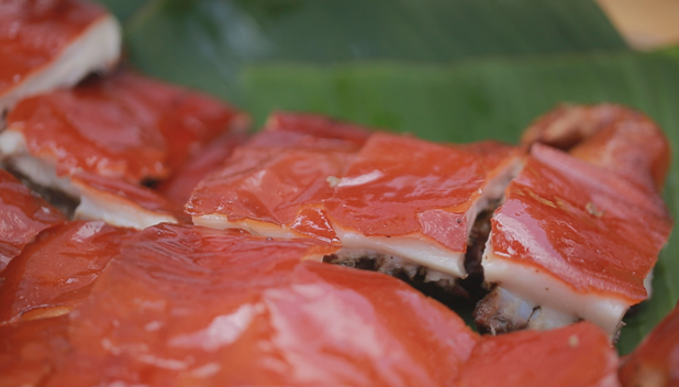 画里屯昌千百味一入口则念终身屯昌烤乳猪