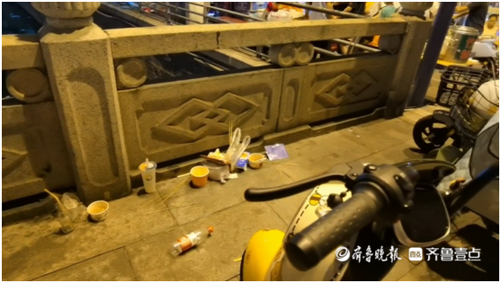 齐鲁壹点·泰安帮办｜占人行道还留油污和垃圾，泰安一夜市被吐槽休闲区蓝鸢梦想 - Www.slyday.coM