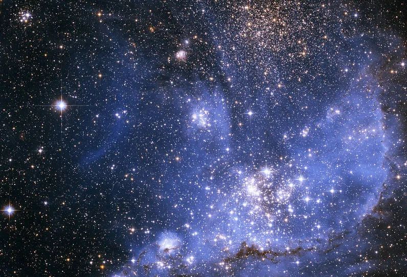 这张照片是哈勃太空望远镜2005年拍摄的。星光闪烁中，这片摇篮显得静谧而璀璨。图片来源：NASA官网