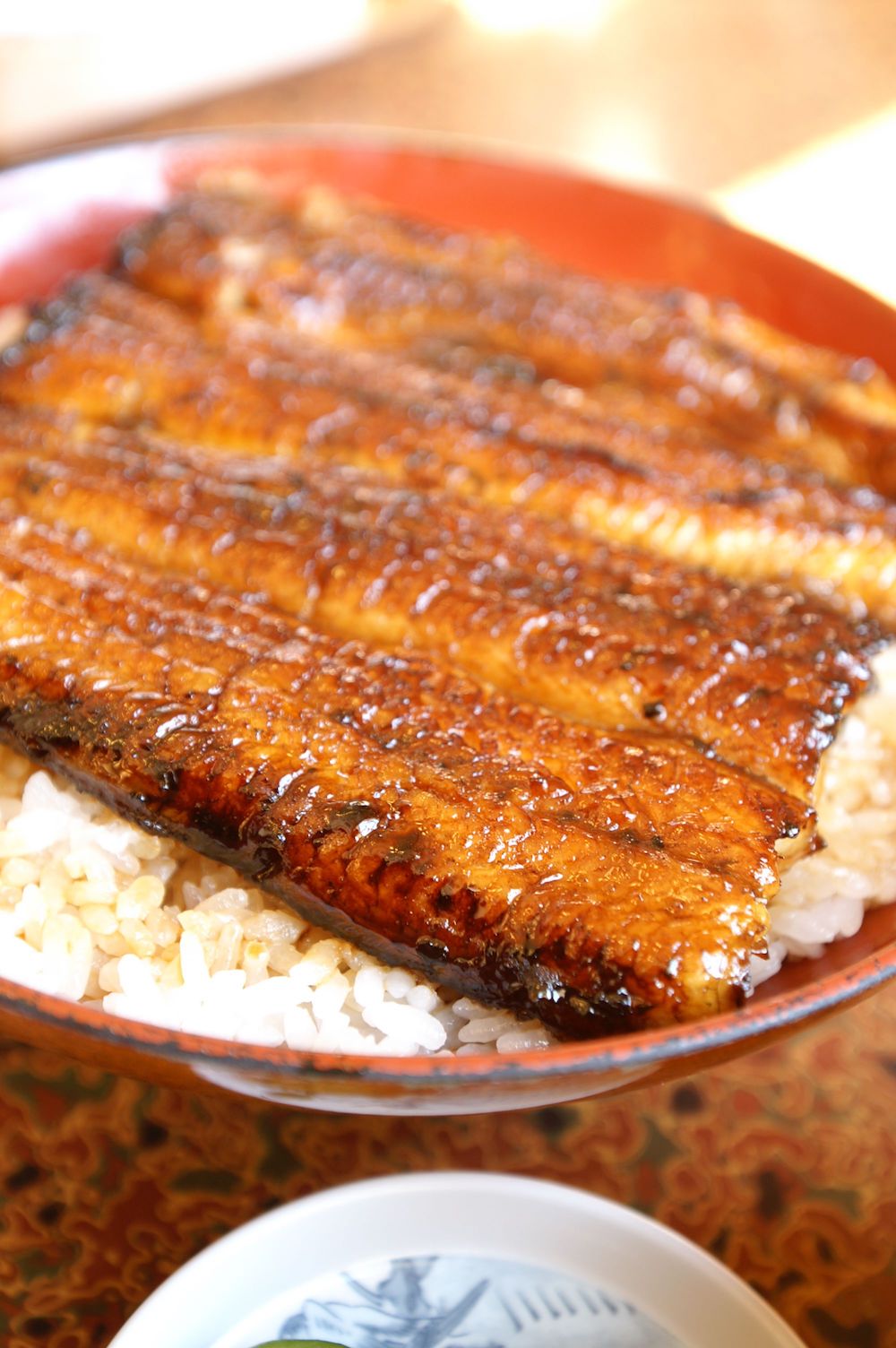 今天日本人所说的河鳗,一般都是指烤河鳗,日文写作"蒲烧".