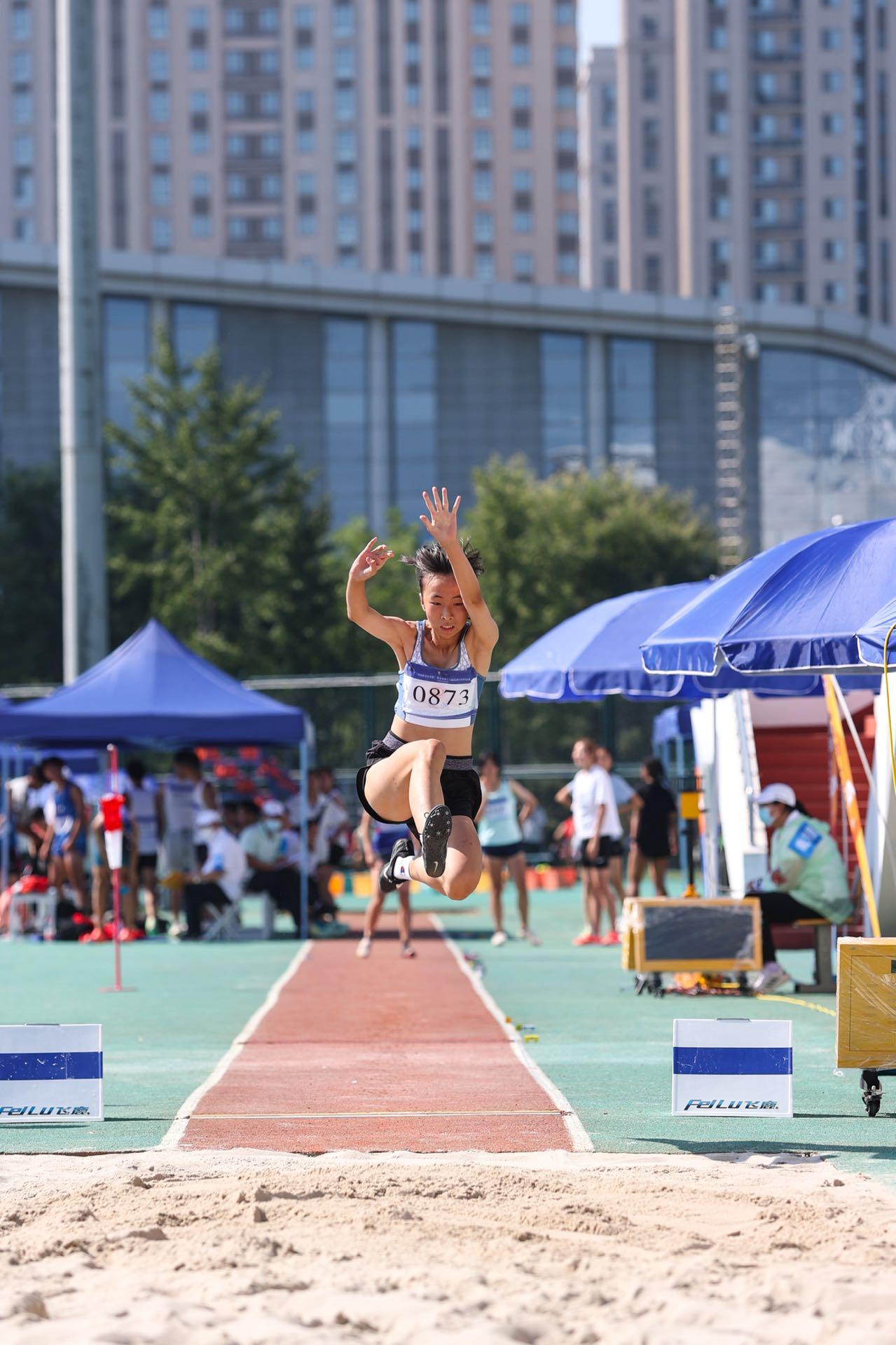 北京市运动会,跳远选手在比赛中.&nbsp; 组委会供图