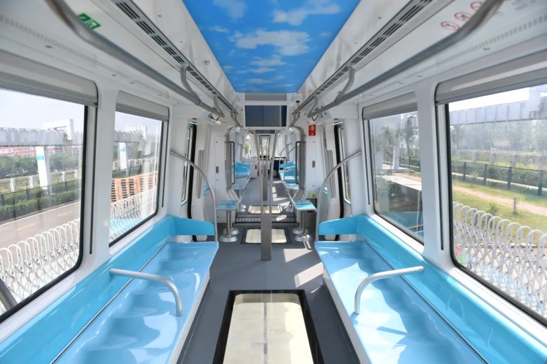 武汉光谷空轨旅游线项目首列“光谷光子号”空轨列车下线__财经头条