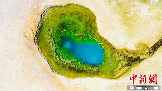 昆仑山下现不冻温泉 宛如蓝宝石落人间休闲区蓝鸢梦想 - Www.slyday.coM