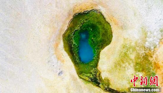 昆仑山下现不冻温泉 宛如蓝宝石落人间休闲区蓝鸢梦想 - Www.slyday.coM