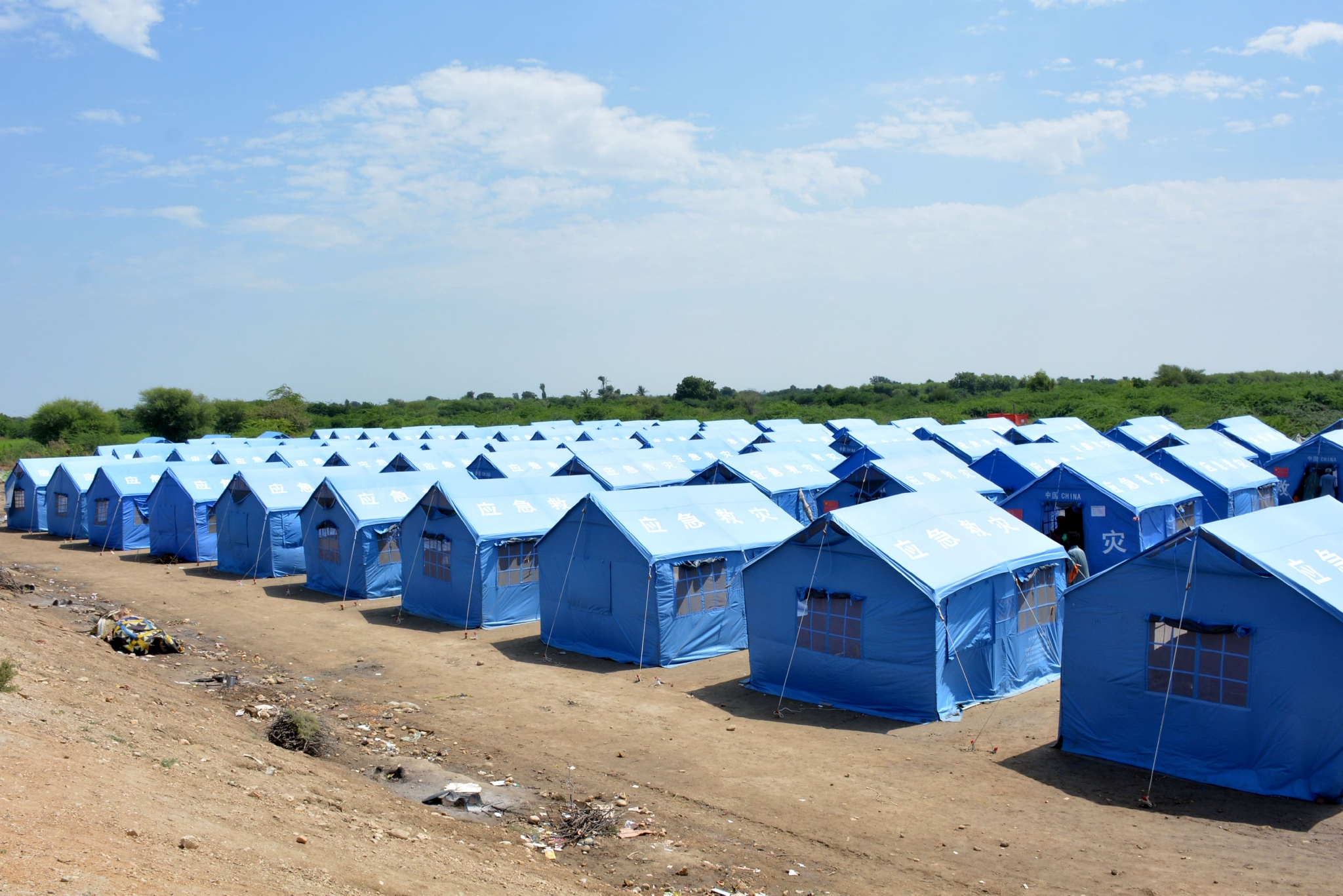巴基斯坦洪灾受灾民众住上中国援助救灾帐篷|灾害_新浪新闻