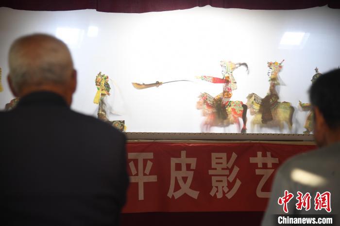 河北皮影艺人的创新路：用老艺术演绎新生活休闲区蓝鸢梦想 - Www.slyday.coM