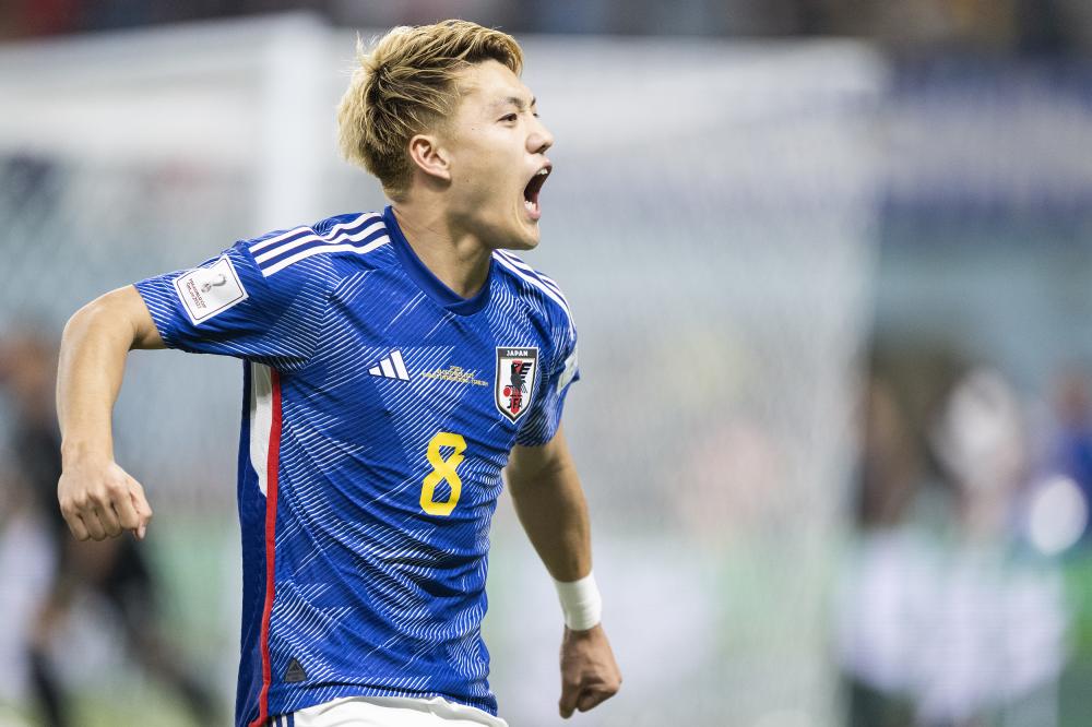 日本以小组第一的成绩昂首晋级世界杯16强
