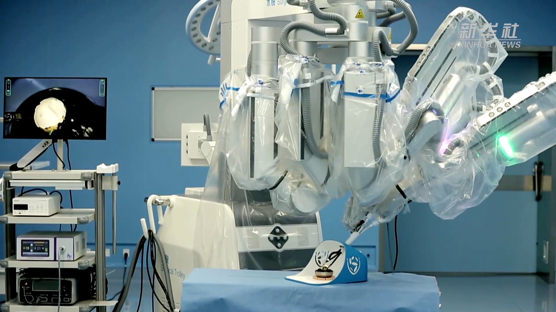 国产单孔蛇形臂机器人助力超微创手术|上海|手术|临床试验_新浪新闻