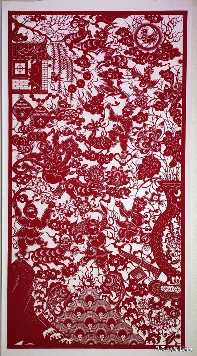 鄂州:雕花剪纸迎新春 十米长卷展空港新城美丽风貌__财经头条