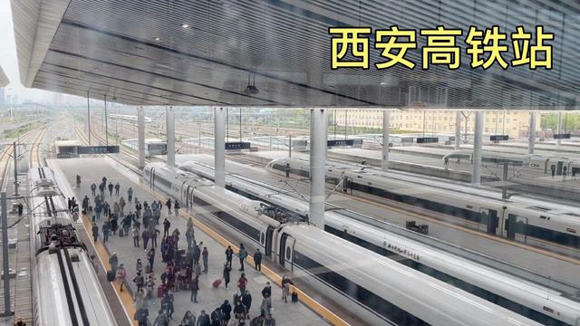 西安高铁站私家车上站台接送乘客，有人质疑该行为是否合规？休闲区蓝鸢梦想 - Www.slyday.coM
