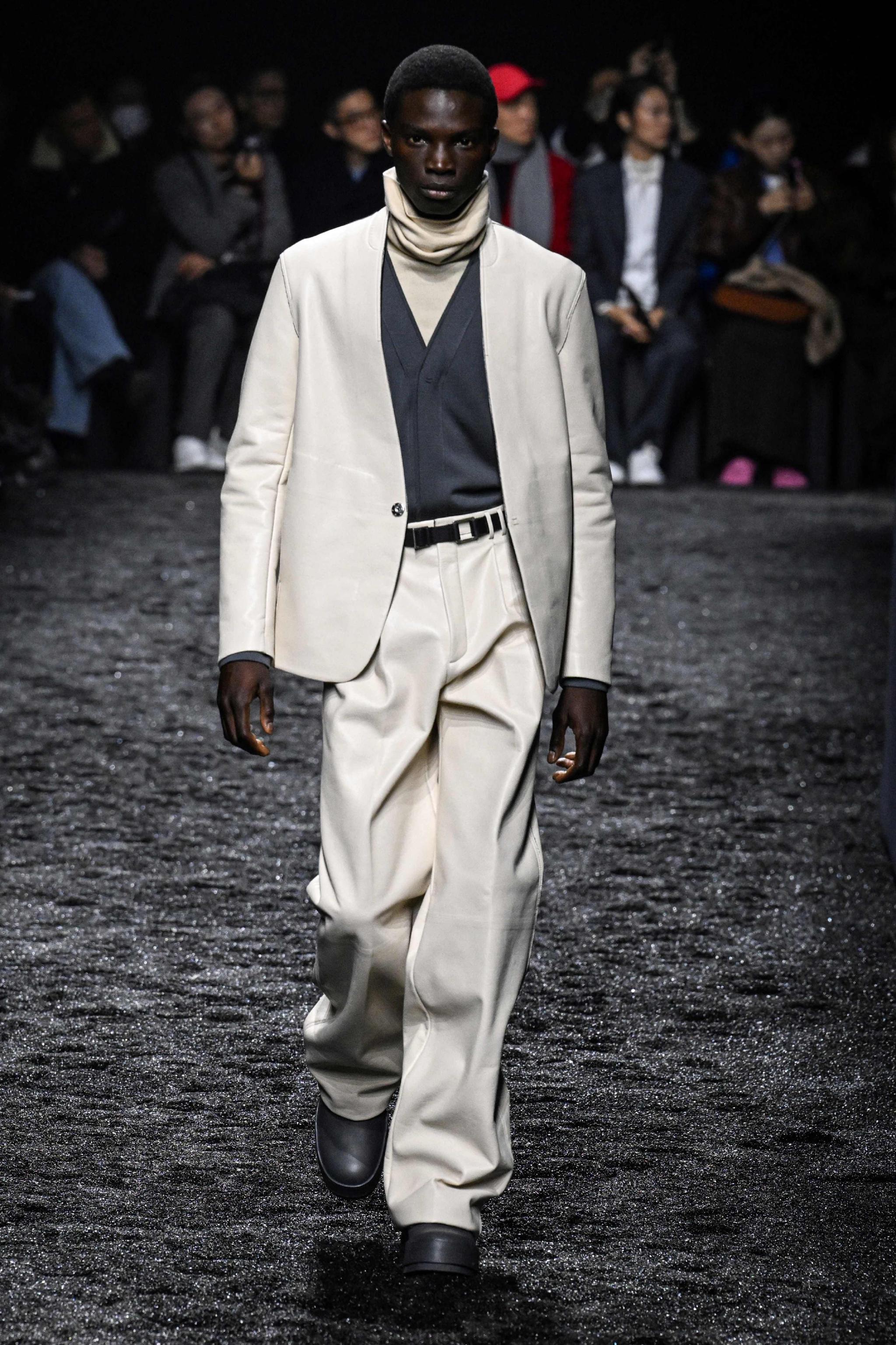 1月16日,模特在意大利米兰男装周上展示杰尼亚品牌的2023/24秋冬新款
