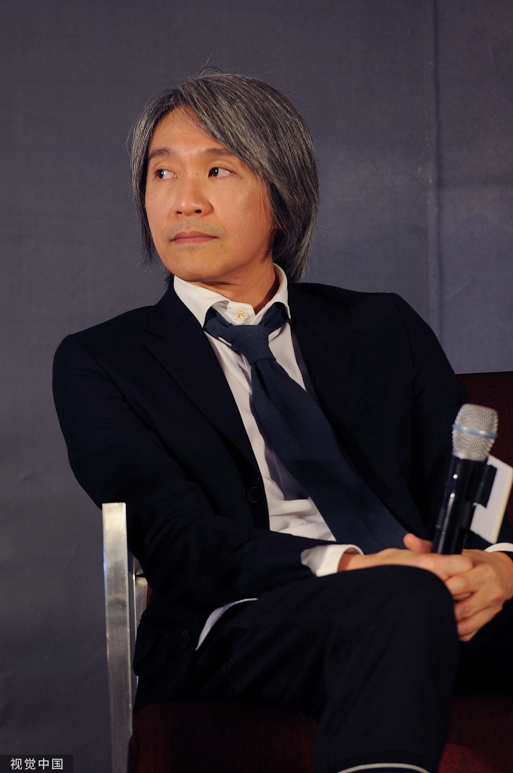 2012年12月,周星驰出席《西游降魔篇》北京记者会.视觉中国 图