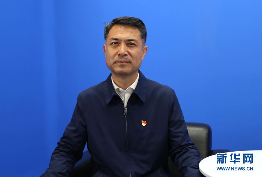 内蒙古自治区工信厅厅长王金豹到新华网内蒙古分公司走访