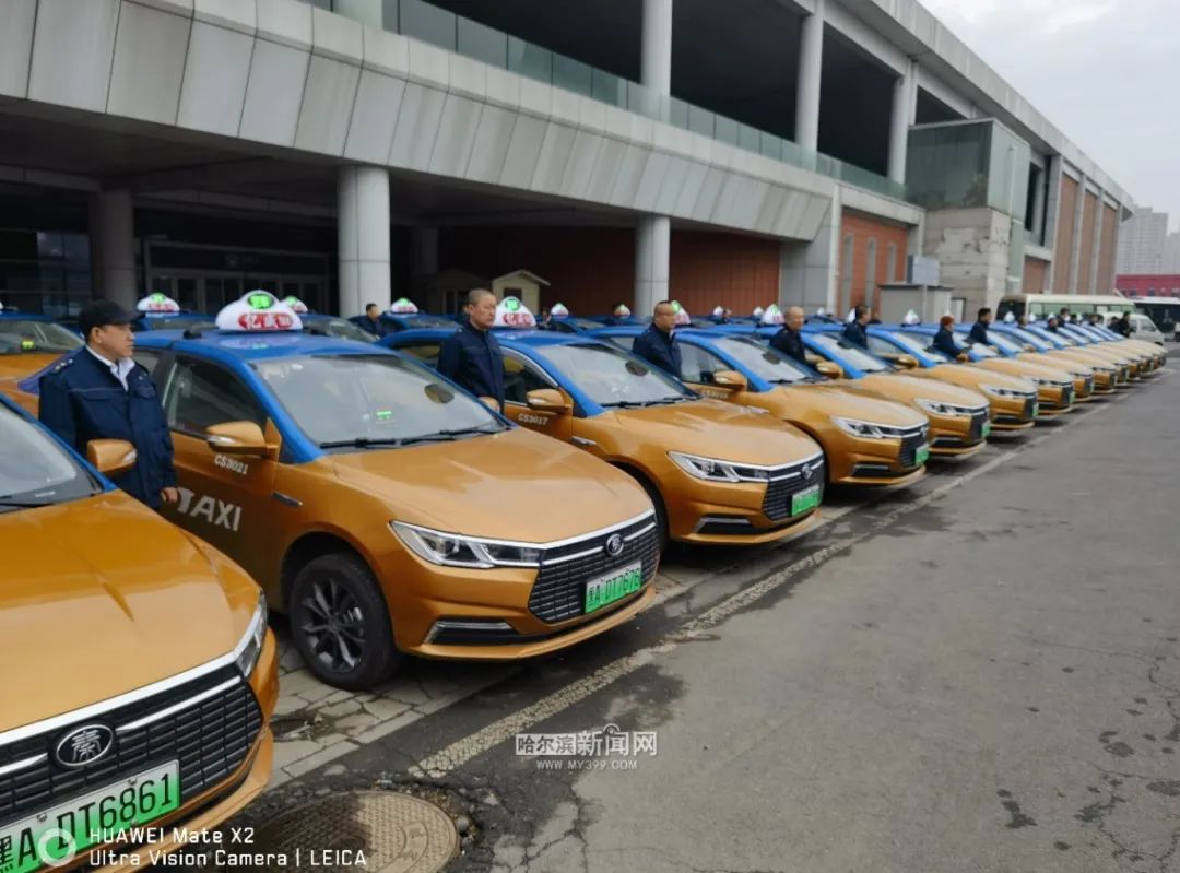 黄车身绿牌照 不收燃油附加费|冰城出租车行业迎来首批电动车|电动