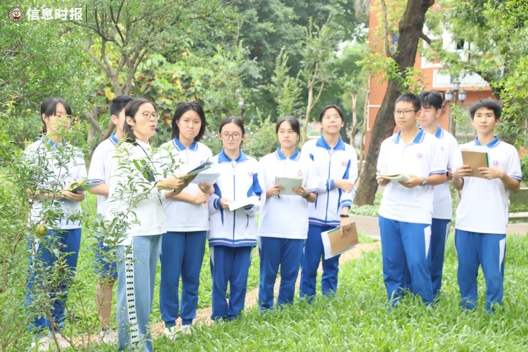 培正中学老师向学生介绍猫头鹰的基本特征和生活习性.