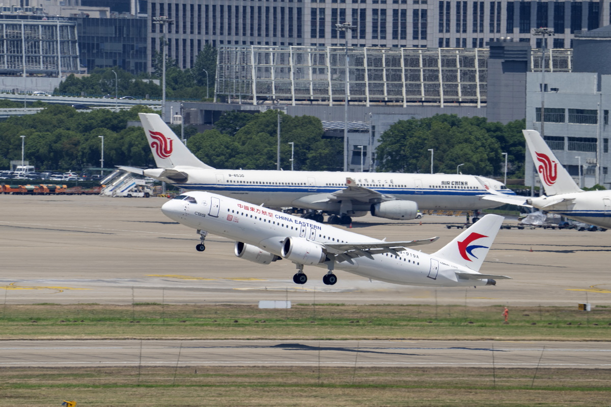 多图直击|翼飞冲天!国产大飞机c919开启商业首航|中国东航c919首航_新