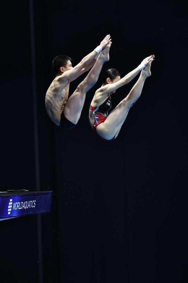 张家齐/王飞龙在比赛中.视觉中国供图