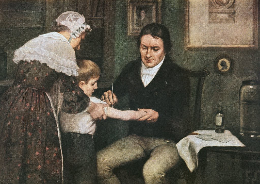 牛痘接种法发明人爱德华·琴纳(edward jenner)正在为一个小男孩接种