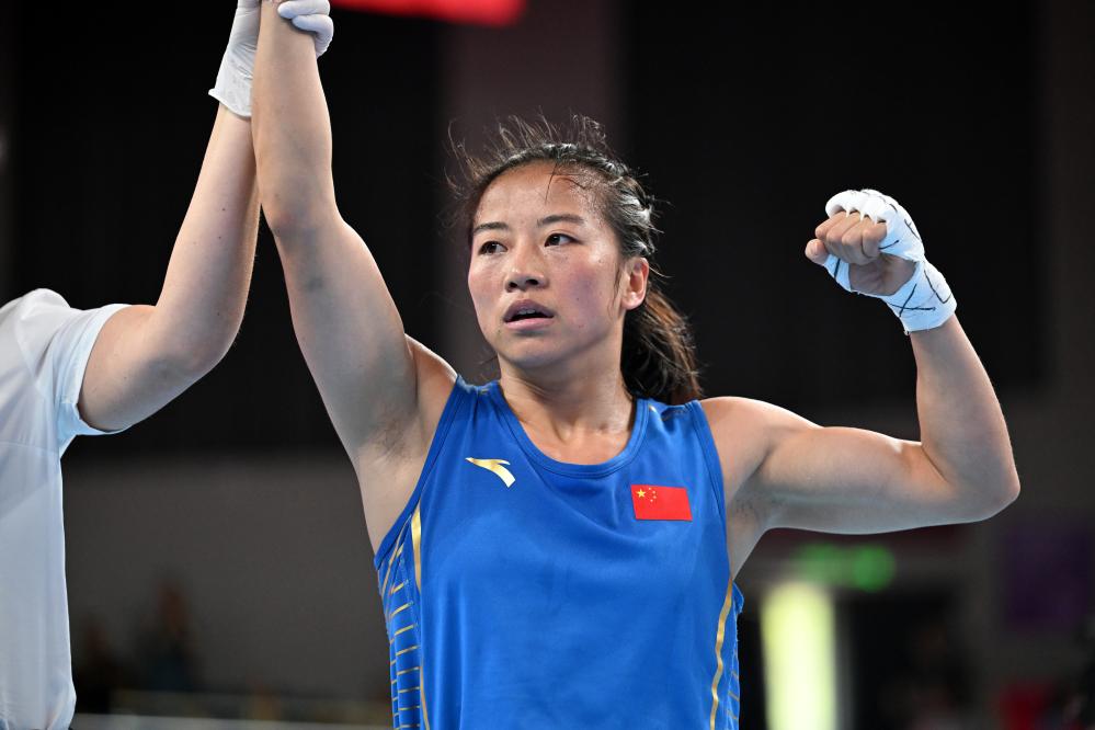 决赛中轻松击败蒙古国选手埃苏根·奥云采采格,晋级女子50公斤级决赛