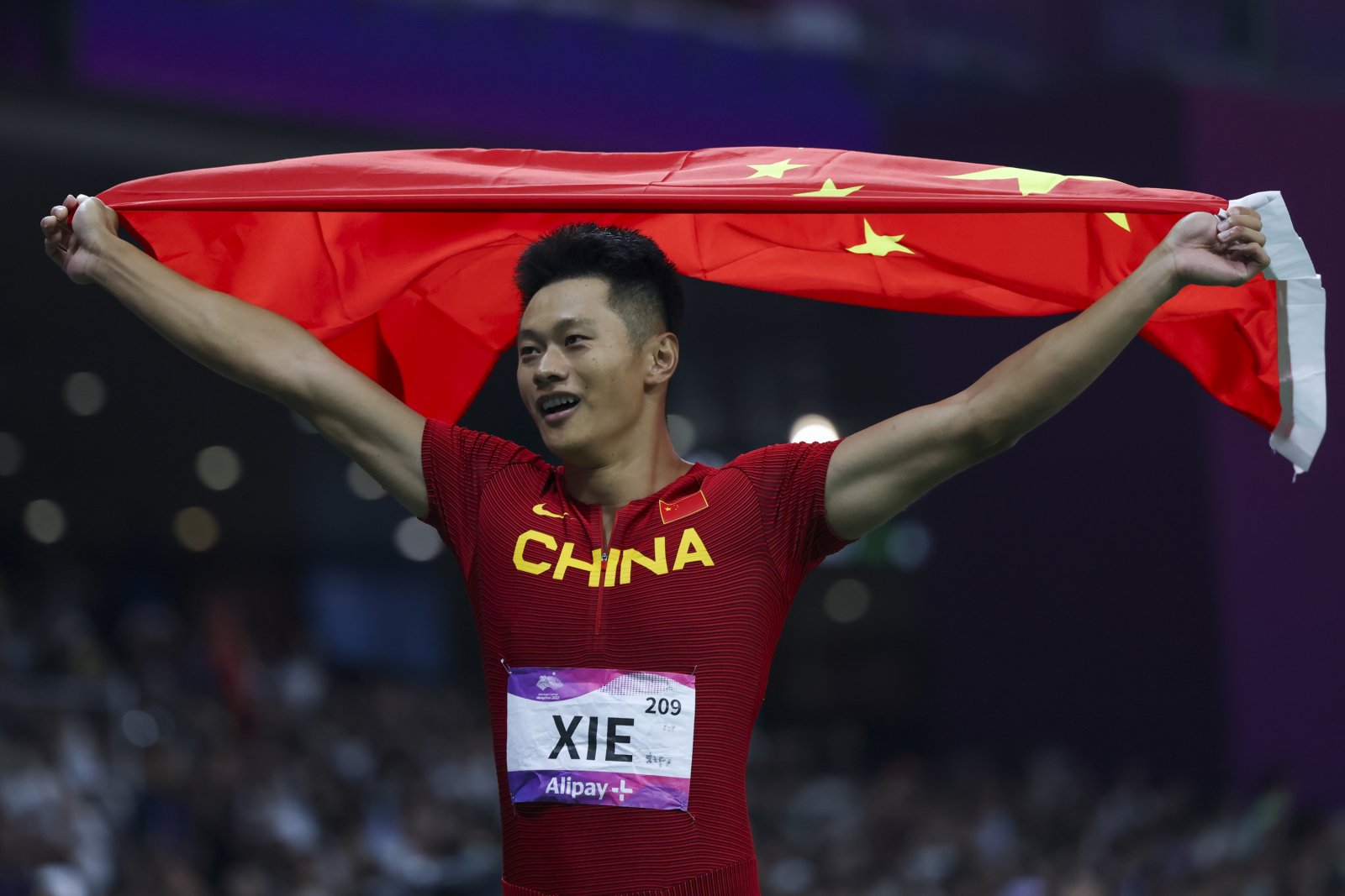 谢震业在男子100米项目上夺金.(图片来源:杭州亚运会媒体在线)