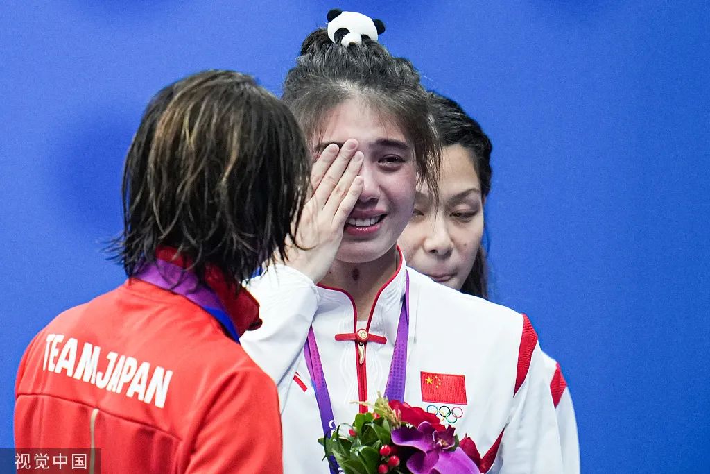 亚运会的精神内核就在运动员彼此的暖心故事里