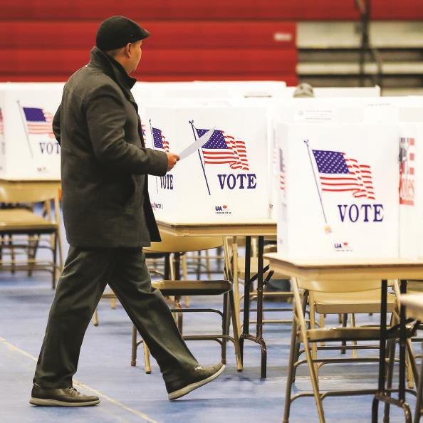 美国选民准备投票  图gj美国2024年总统选举艾奥瓦州初选将于当地时间