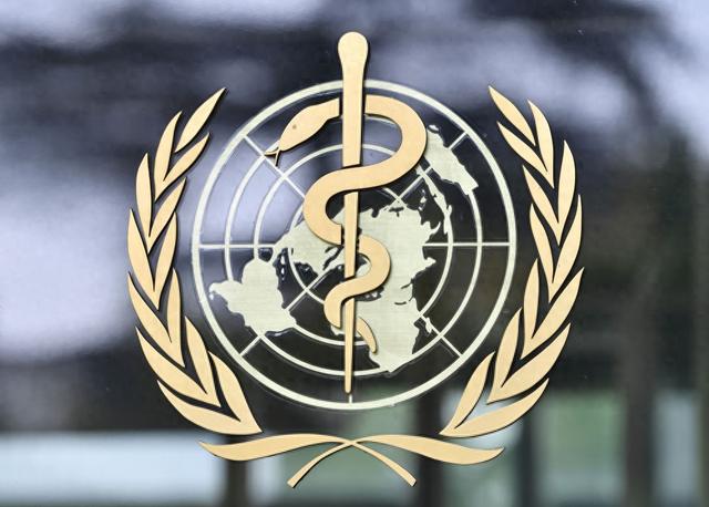 图为2023年5月21日在瑞士日内瓦世界卫生组织总部大楼拍摄的世卫组织标志。新华社记者 连漪 摄