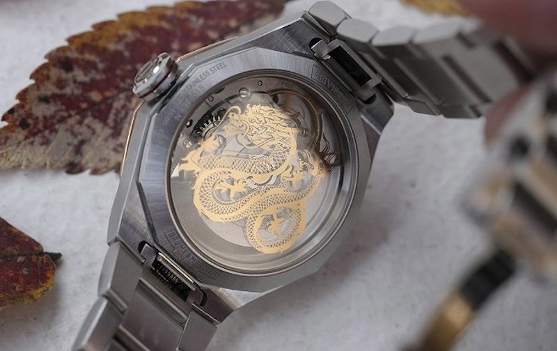 中国艺术家陈粉丸,将指针,齿轮以及螺丝进行层叠设计,塑造出3d立体龙