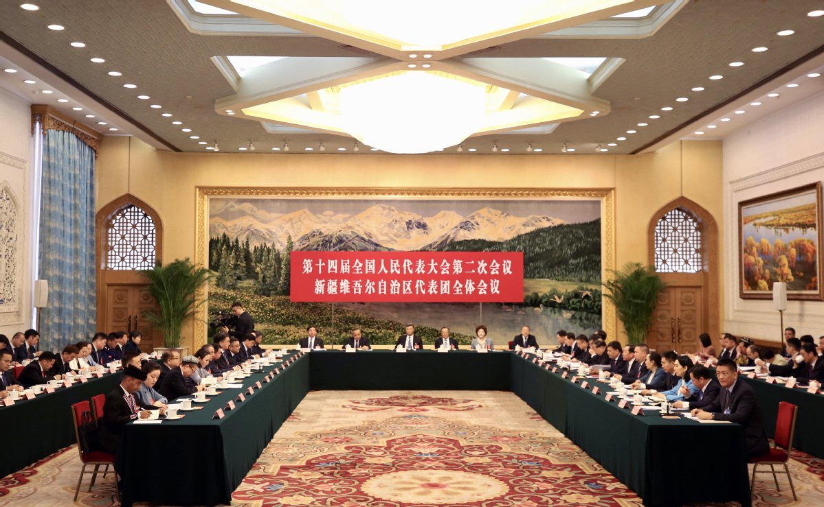 新疆代表团举行开放团组会议|新疆|团组|代表团_新浪新闻