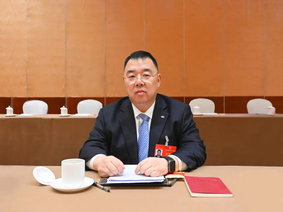 全国人大代表袁国华:为国家更高水平金融开放探路破局 | 两会声音