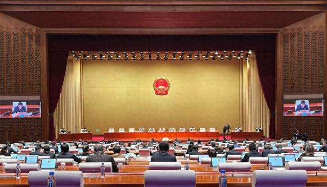 3月28日，北京市十六届人大常委会第九次会议现场。 中青报·中青网记者 张艺/摄