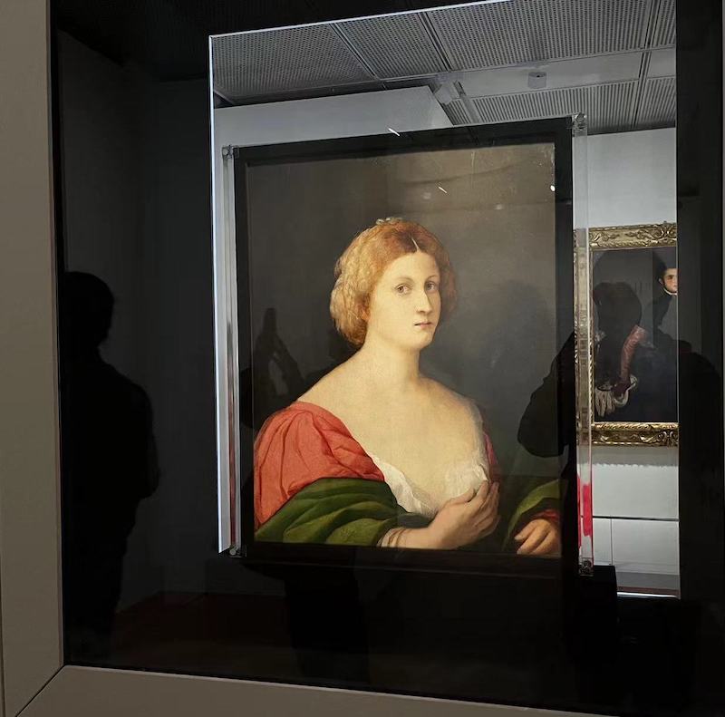 展览现场，老帕尔马《女子肖像与男子肖像》中的女子肖像