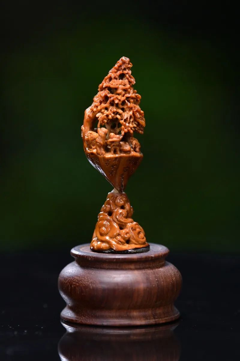 榄核之中独具匠心的榄雕手艺人曾经还能被作为贡品小小乌榄壳能变出